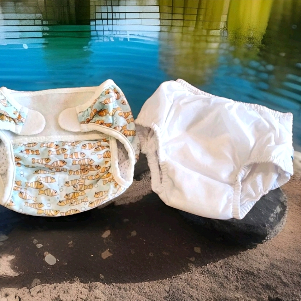 Infant swim diaper bundle Size 6-12 months. Colors white blue orange